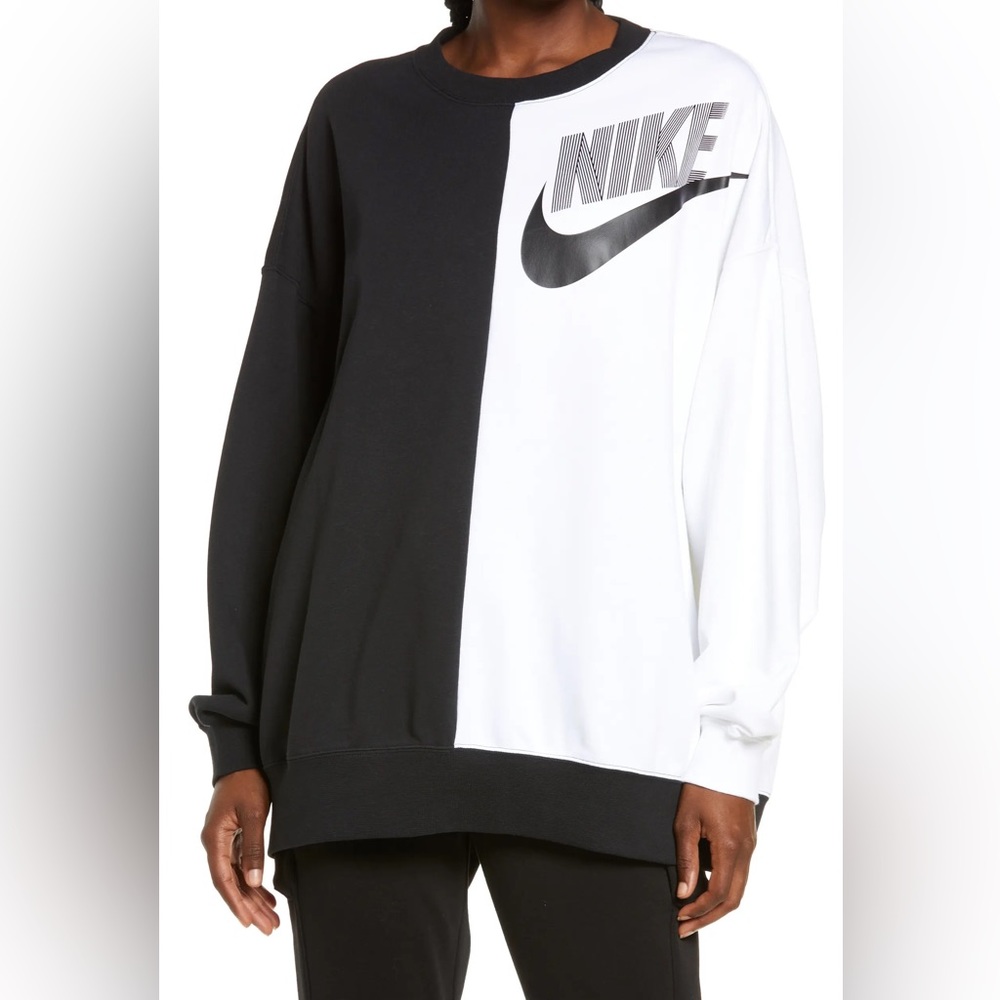 Bold colorblocking bisects a sweatshirt made of cotton-blend fleece.